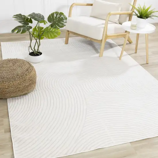 Cream And Beige Geometric Area Rug Photo 1