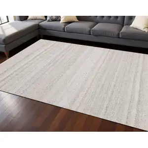 Photo of Cream And Beige Geometric Hand Woven Area Rug