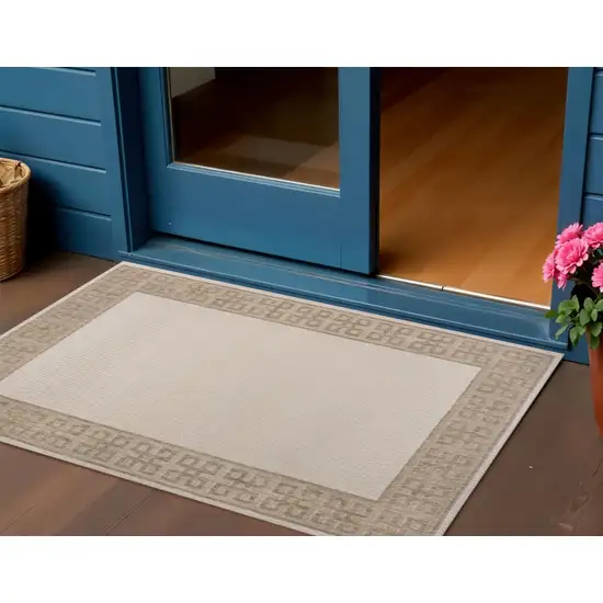 Cream And Beige Indoor Outdoor Area Rug Photo 1