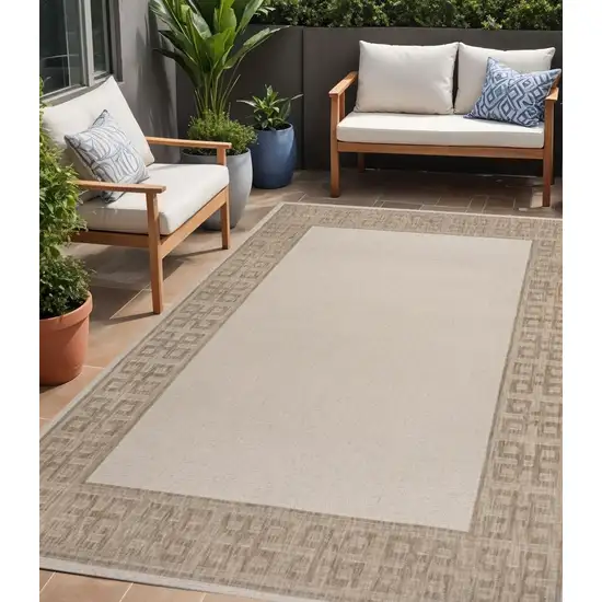Cream And Beige Indoor Outdoor Area Rug Photo 1