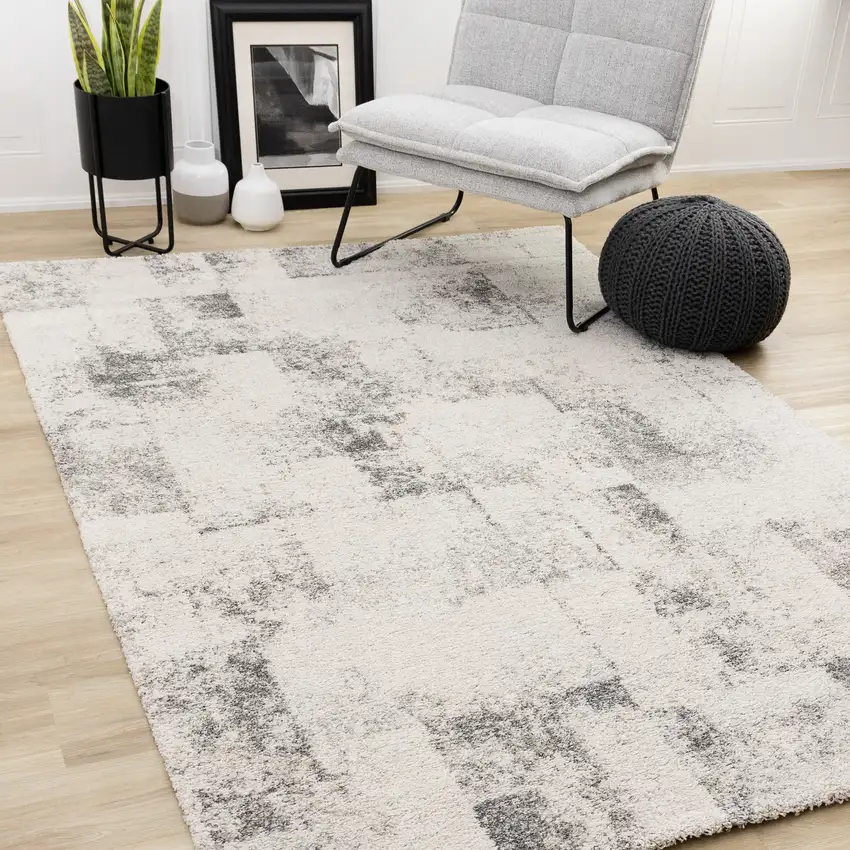 Cream And Black Abstract Area Rug Photo 4