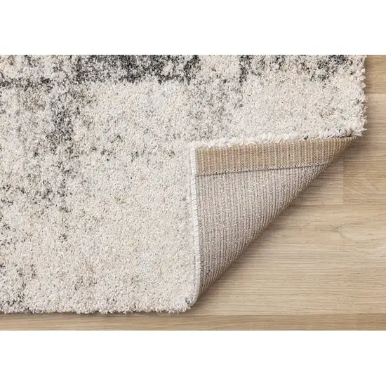 Cream And Black Abstract Area Rug Photo 8