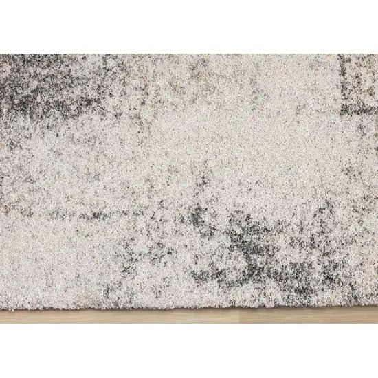 Cream And Black Abstract Area Rug Photo 9