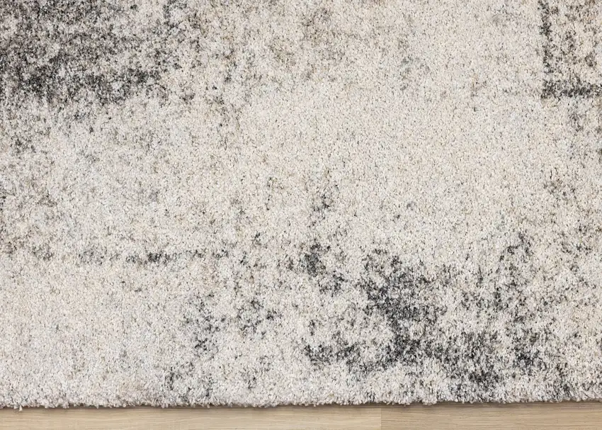 Cream And Black Abstract Area Rug Photo 9