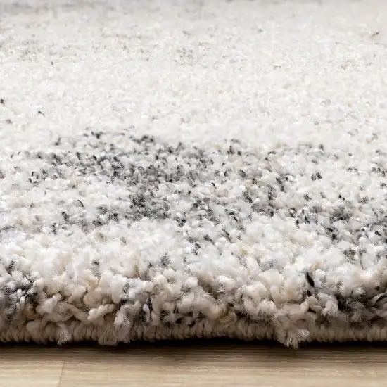 Cream And Black Abstract Area Rug Photo 9