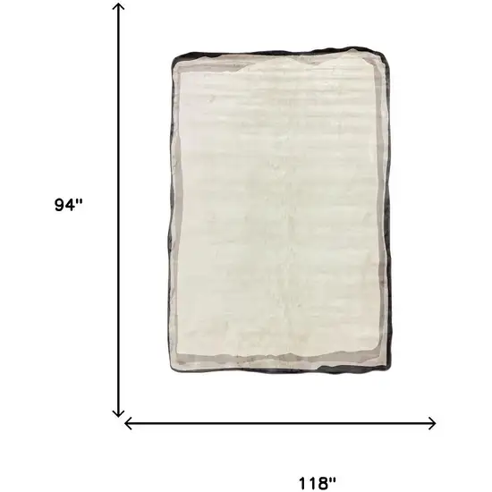 Cream And Black Abstract Area Rug Photo 5