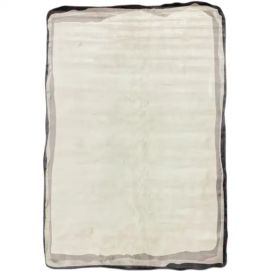 Cream And Black Abstract Area Rug Photo 2