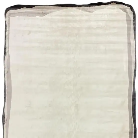 Cream And Black Abstract Area Rug Photo 3