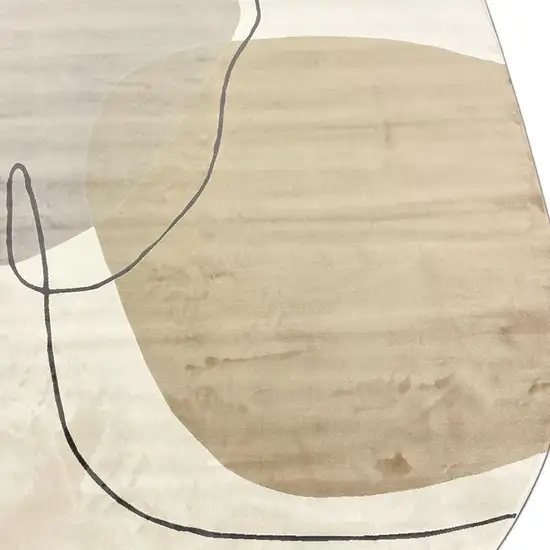 Cream And Black Abstract Oval Rug Photo 3