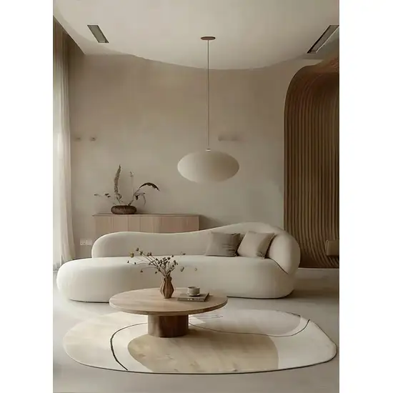 Cream And Black Abstract Oval Rug Photo 1