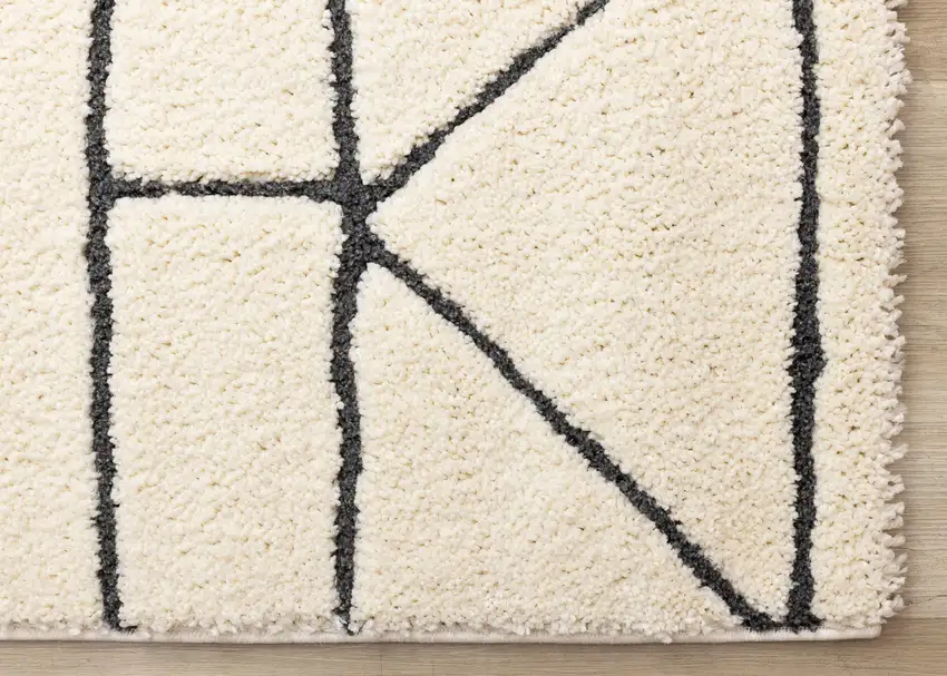 Cream And Black Geometric Area Rug Photo 9