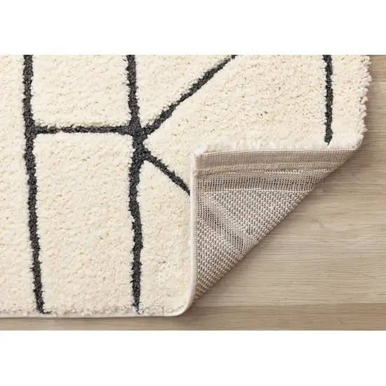 Cream And Black Geometric Area Rug Photo 9