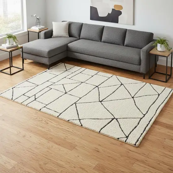 Cream And Black Geometric Area Rug Photo 1