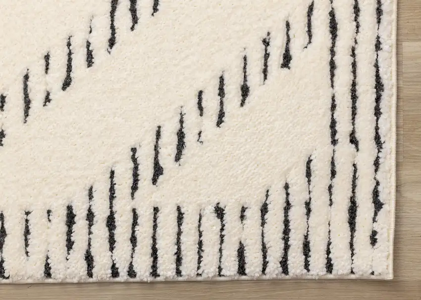 Cream And Black Geometric Area Rug Photo 8