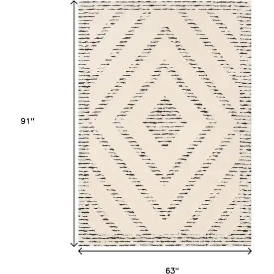 Cream And Black Geometric Area Rug Photo 3