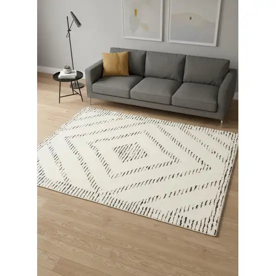 Cream And Black Geometric Area Rug Photo 1