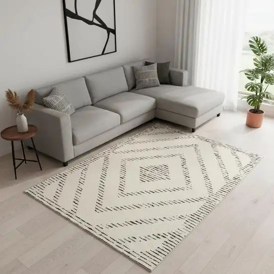 Cream And Black Geometric Area Rug Photo 1