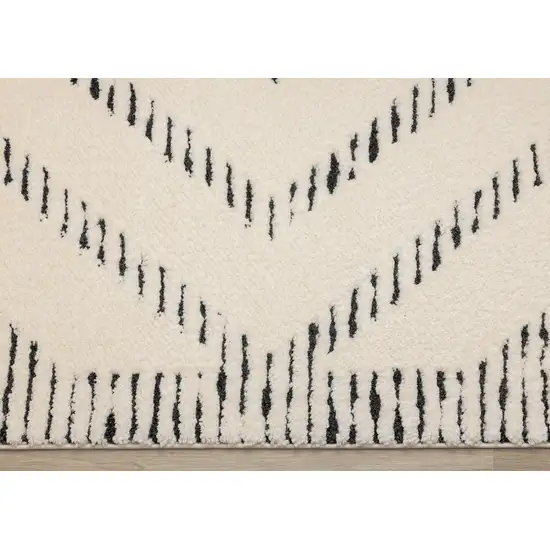 Cream And Black Geometric Area Rug Photo 9