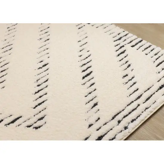 Cream And Black Geometric Area Rug Photo 6