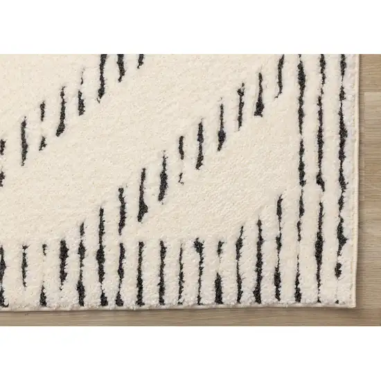 Cream And Black Geometric Area Rug Photo 7