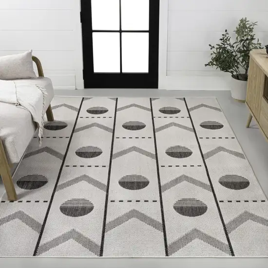 Cream And Black Geometric Indoor Outdoor Area Rug Photo 5