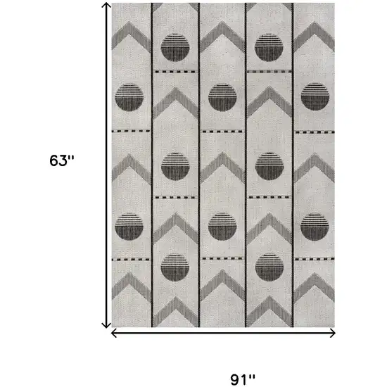 Cream And Black Geometric Indoor Outdoor Area Rug Photo 9