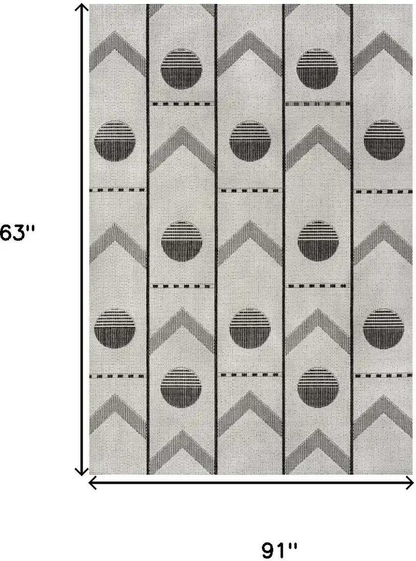 Cream And Black Geometric Indoor Outdoor Area Rug Photo 9