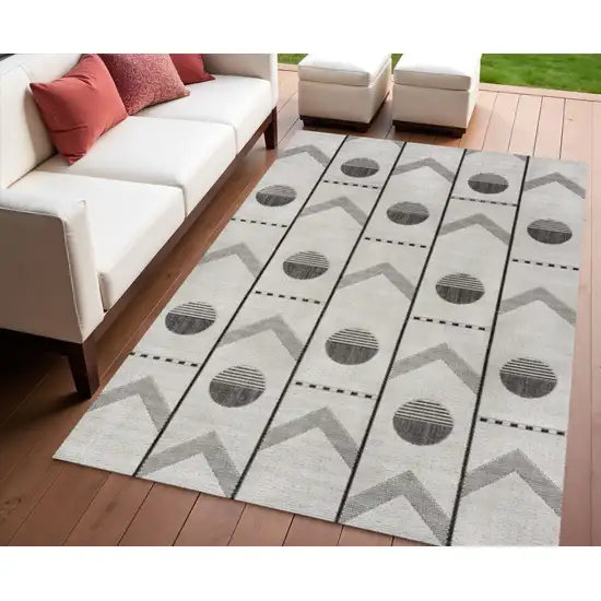 Cream And Black Geometric Indoor Outdoor Area Rug Photo 1