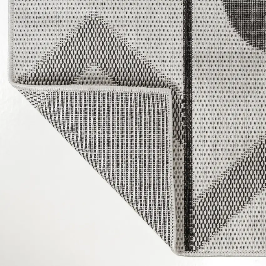 Cream And Black Geometric Indoor Outdoor Area Rug Photo 3