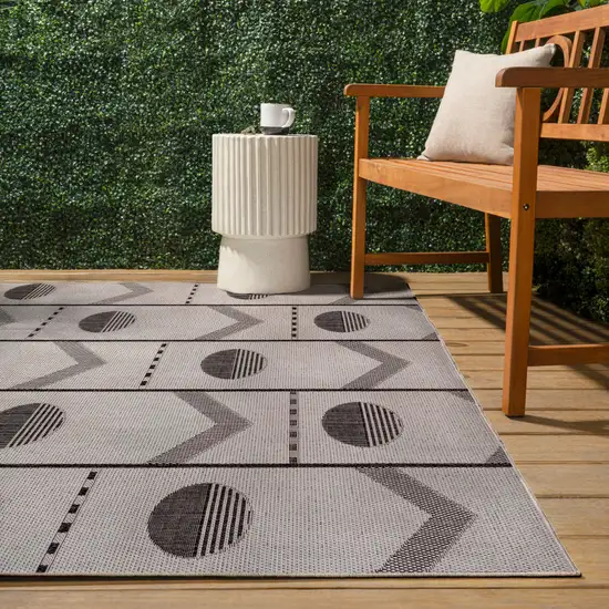 Cream And Black Geometric Indoor Outdoor Area Rug Photo 8