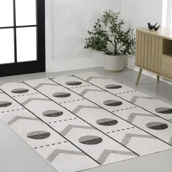Cream And Black Geometric Indoor Outdoor Area Rug Photo 5