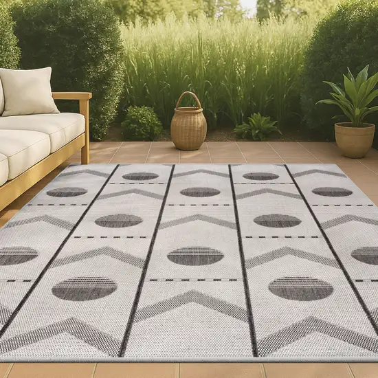 Cream And Black Geometric Indoor Outdoor Area Rug Photo 4