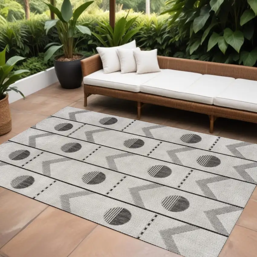 Cream And Black Geometric Indoor Outdoor Area Rug Photo 1