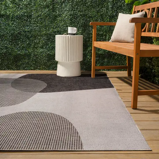 Cream And Black Geometric Indoor Outdoor Area Rug Photo 6