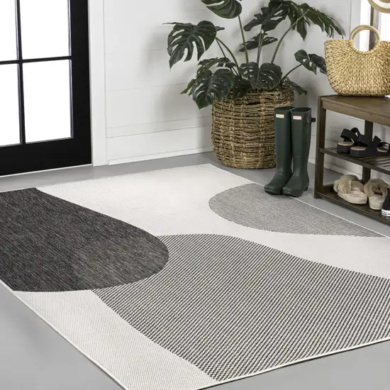 Cream And Black Geometric Indoor Outdoor Area Rug Photo 3