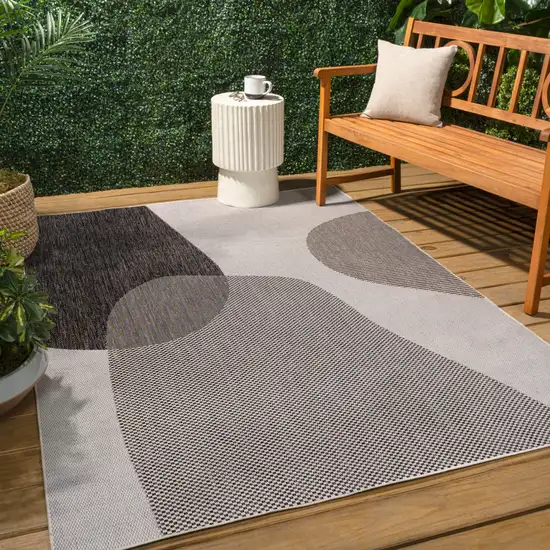 Cream And Black Geometric Indoor Outdoor Area Rug Photo 5