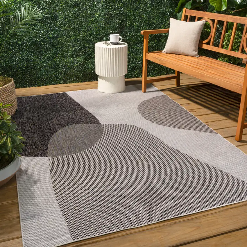 Cream And Black Geometric Indoor Outdoor Area Rug Photo 5