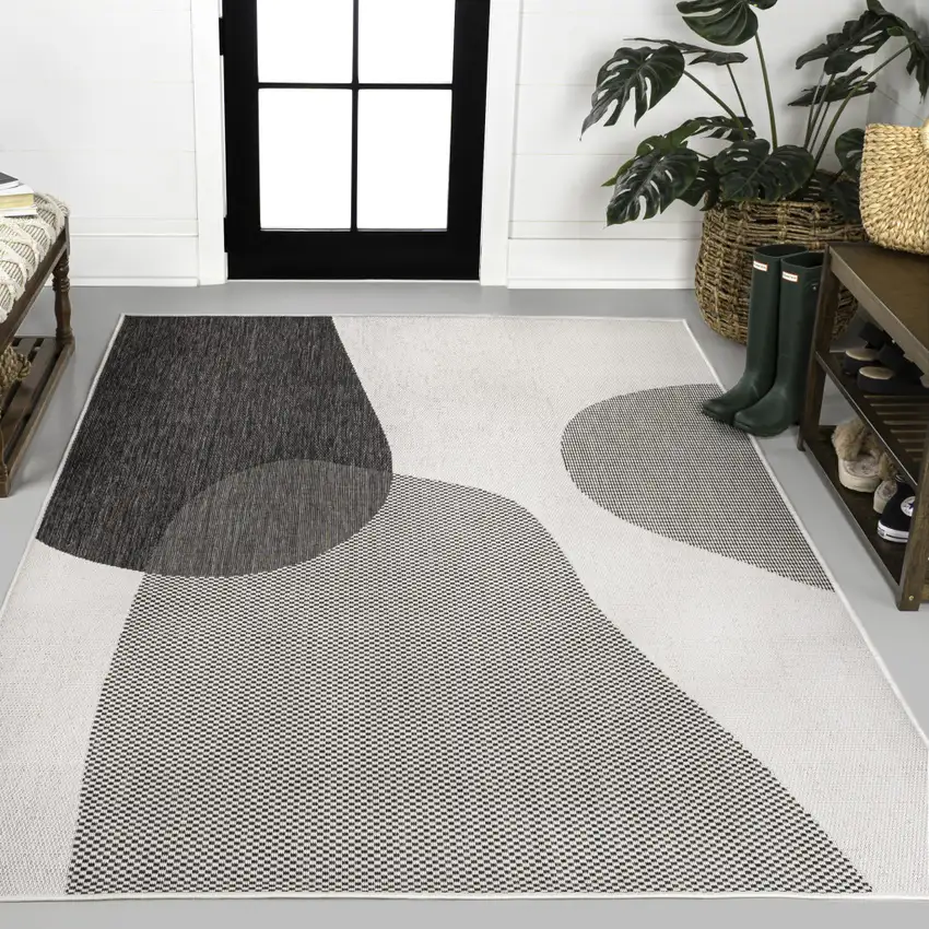 Cream And Black Geometric Indoor Outdoor Area Rug Photo 4