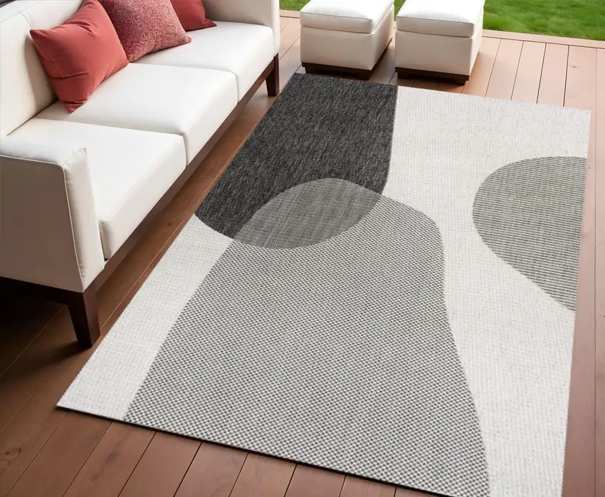 Cream And Black Geometric Indoor Outdoor Area Rug Photo 1
