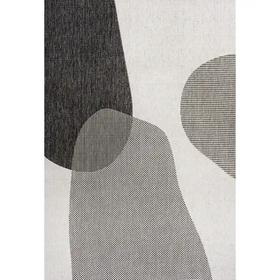 Cream And Black Geometric Indoor Outdoor Area Rug Photo 1