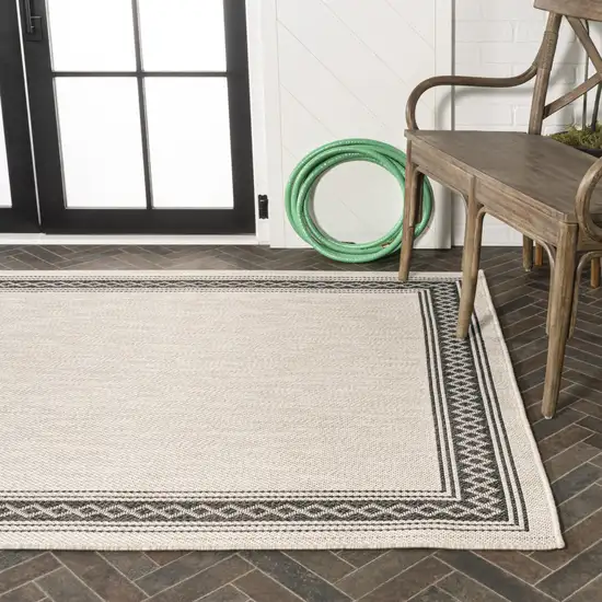 Cream And Black Indoor Outdoor Area Rug Photo 9