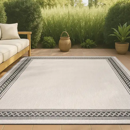Cream And Black Indoor Outdoor Area Rug Photo 4