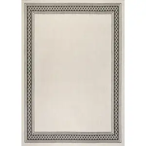 Photo of Cream And Black Indoor Outdoor Area Rug