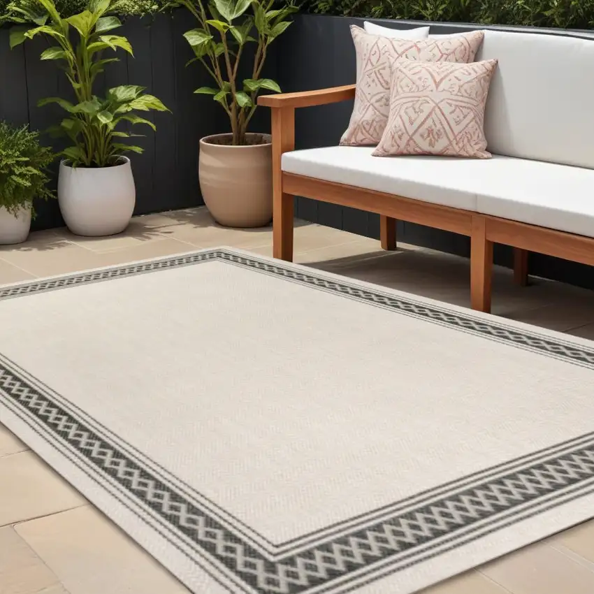 Cream And Black Indoor Outdoor Area Rug Photo 1