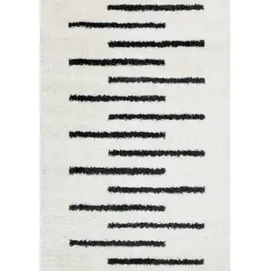 Photo of Cream And Black Striped Area Rug