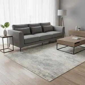 Photo of Cream And Blue Abstract Area Rug