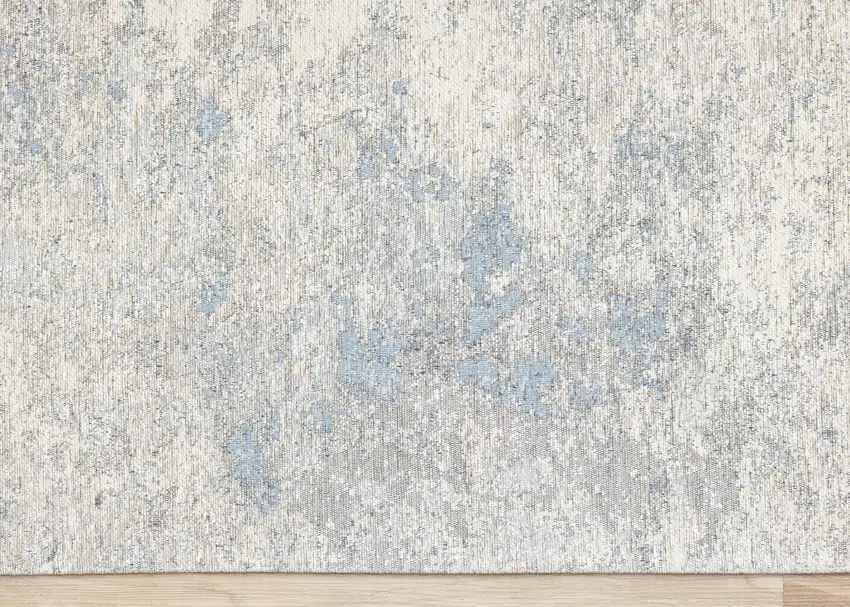 Cream And Blue Abstract Area Rug Photo 9
