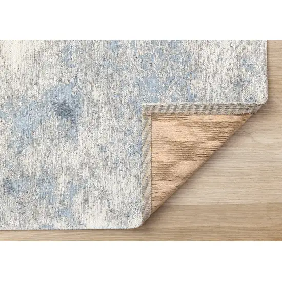 Cream And Blue Abstract Area Rug Photo 8