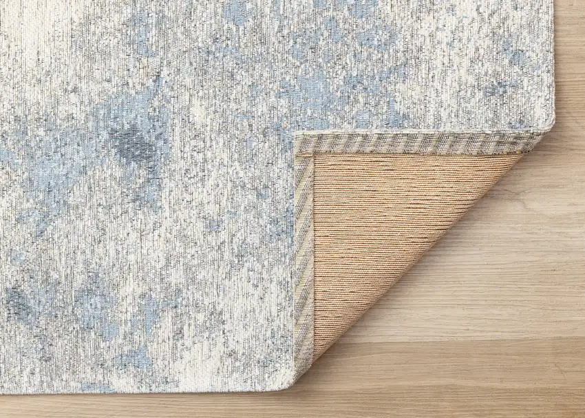 Cream And Blue Abstract Area Rug Photo 8