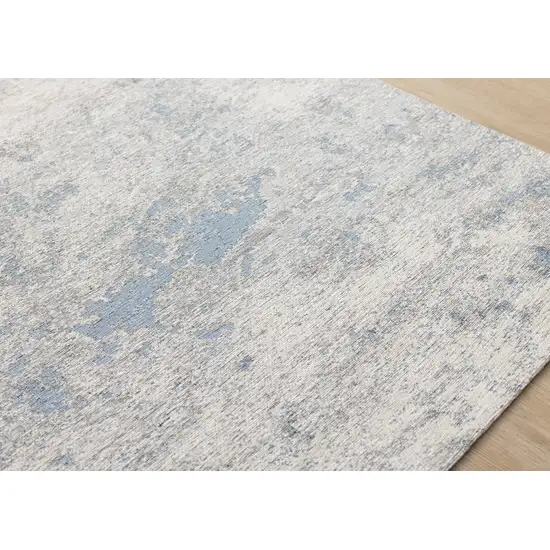 Cream And Blue Abstract Area Rug Photo 6